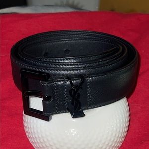 Belt with square buckle featuring a Cassandre logo